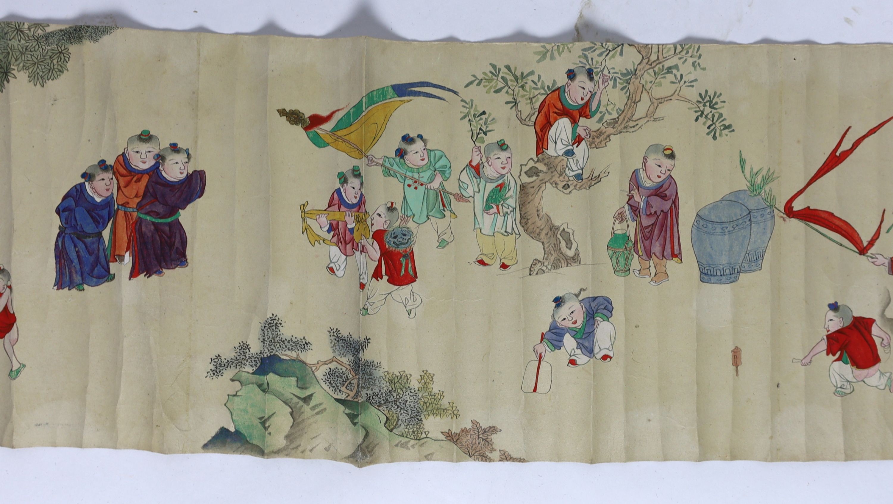 A Chinese handscroll painting on paper of ‘Hundred boys’ in a garden, late Qing dynasty, image 570cm x 26cm